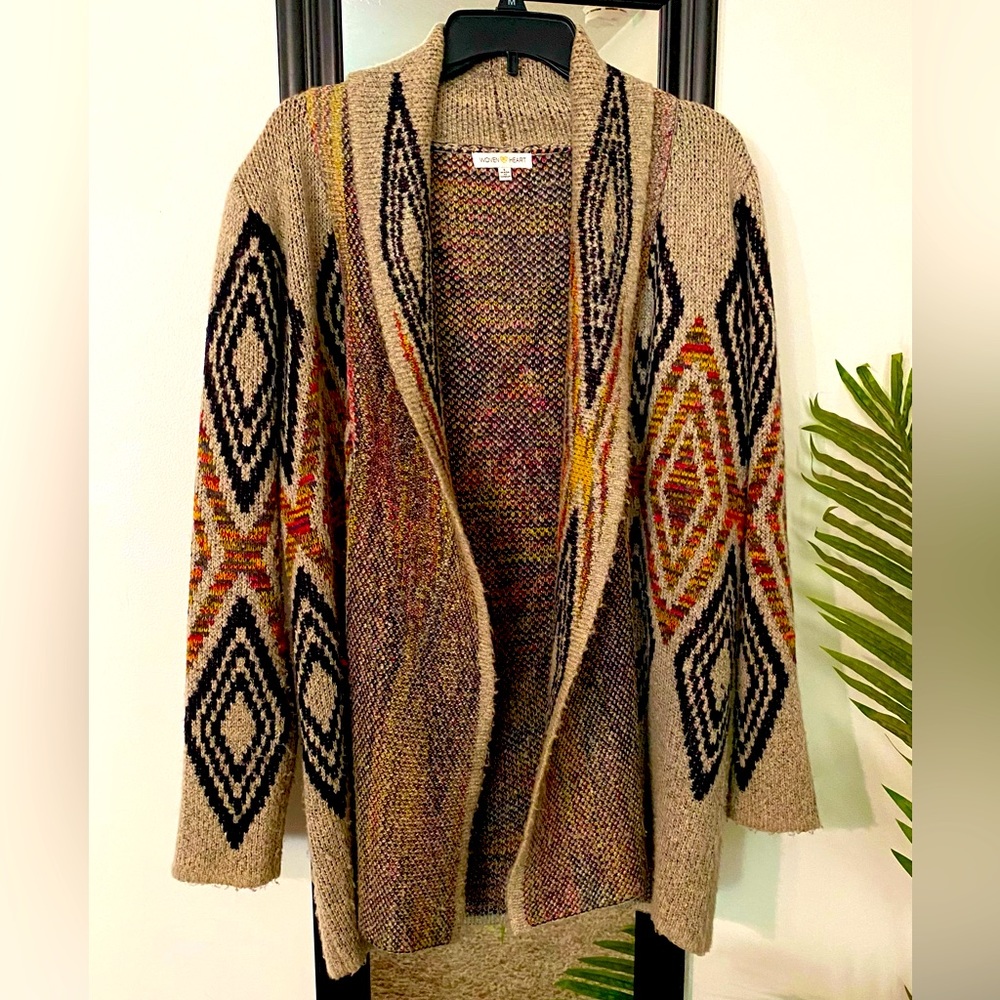 Woven Heart, large cardigan sweater. No pockets, thick, warm, mid thigh length.